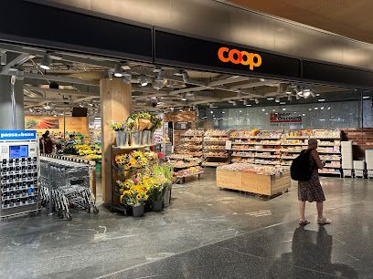 Coop Supermarkt Zürich Airport Shopping, магазин біля вокзалу Zürich Flughafen
