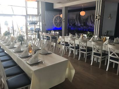 Tawerna Marina, біля вокзалу Giżycko