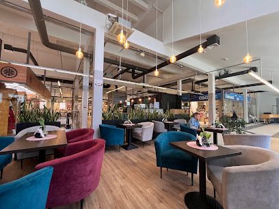 Cafe del Mondo, біля вокзалу Krynica-Zdrój