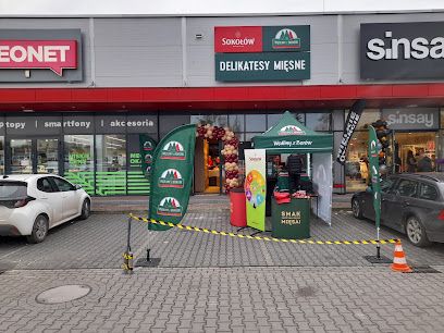 Delikatesy Mięsne Sokołów, магазин біля вокзалу Могільно