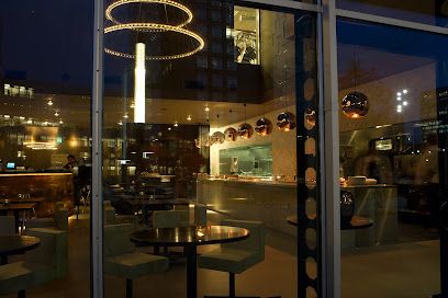 Gustavino Restaurant & Vinoteca, біля вокзалу Amsterdam Zuid