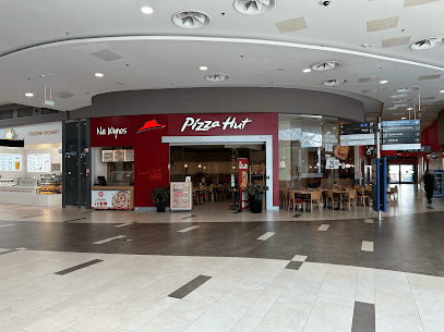 Pizza Hut Poznań City Center, біля вокзалу Poznań Główny