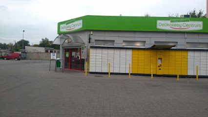 Delikatesy Centrum, магазин біля вокзалу Згожелець