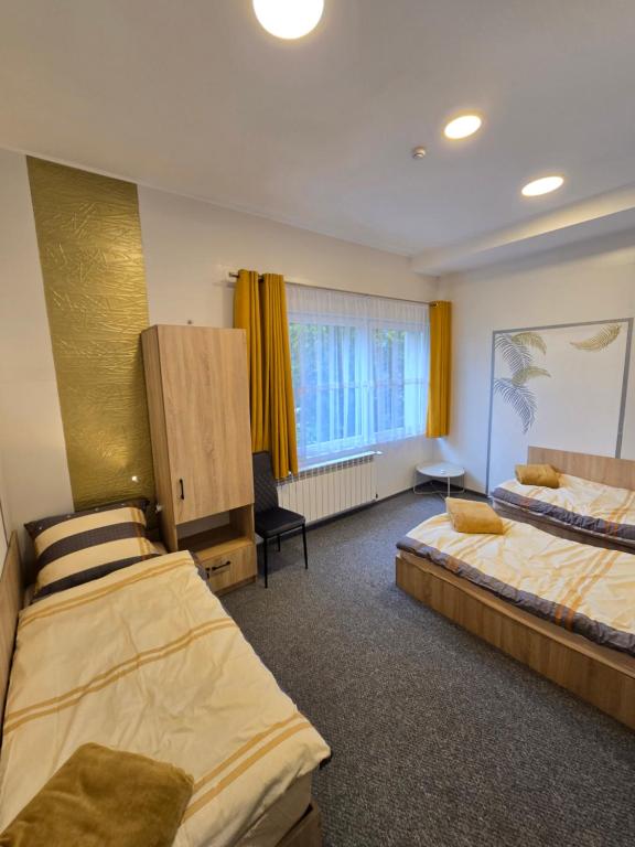 Pokoje gościnne GOOD NIGHT apartamenty, noclegi, житло біля вокзалу Бендзин Місто