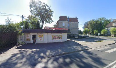 Bajbus. Sklep spożywczy. Mazur E., магазин біля вокзалу Шамотули